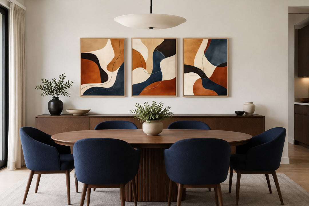 3 piece mid-century modern abstract wall art with earth tones, brown, cream, and navy blue frames.