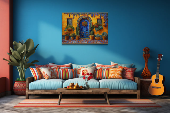 Mexican Door With Cacti Traditional Painting Framed Canvas Wall Art in a living room with a couch and a guitar