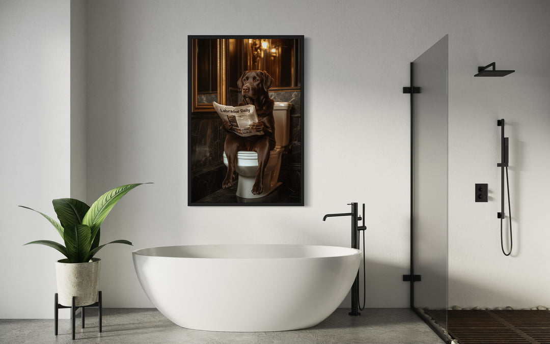 Chocolate Brown Labrador Retriever On Toilet Reading Newspaper Framed Canvas Wall Art in a bath room with a toilet and a bath tub