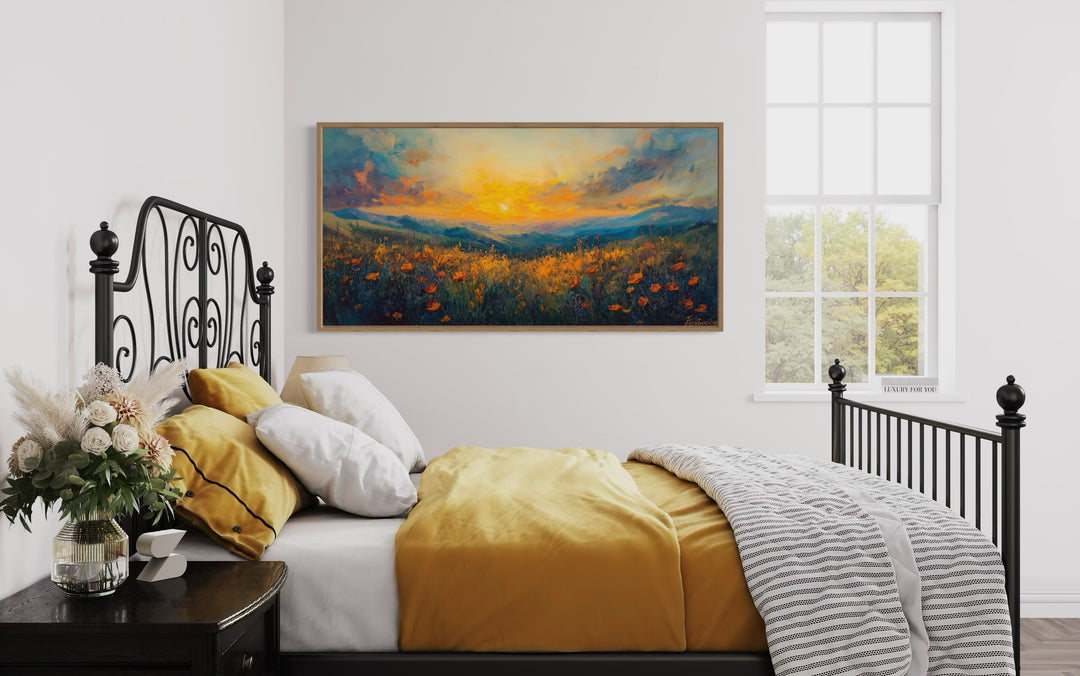 Beautiful Wildflower Field At Sunset Painting Framed Canvas Wall Art in a yellow a bedroom with a bed