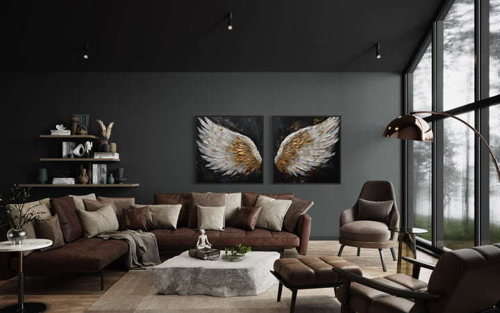 2 Piece White Gold Angel Wings On Black Background Framed Canvas Wall Art in a living room filled with furniture and a large window