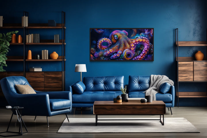 a living room with a blue couch and a painting on the wall