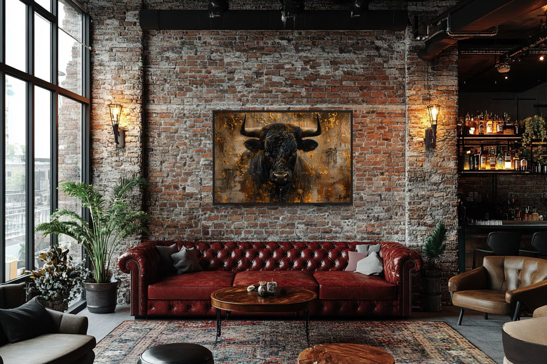 Charging Bull Head on Gold and Black Framed Canvas Wall Art in brick wall