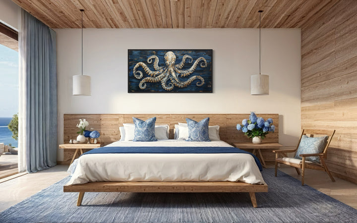 Octopus Painting On Navy Blue Wood Framed Canvas Wall Art in coastal bedroom