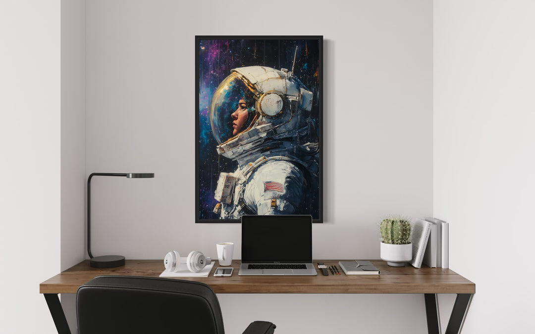 Female Astronaut Graffiti Framed Canvas Wall Art in the office