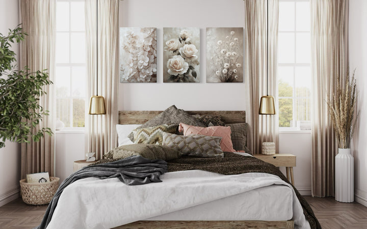 3 Piece Neutral Boho Floral Farmhouse Framed Canvas Wall Art in a bedroom with a bed