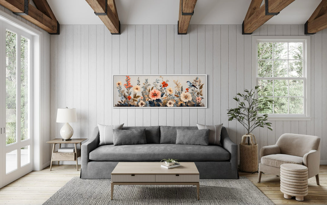 Floral Bouquet with Bird Panoramic Framed Tapestry Canvas Wall Art above couch in living room