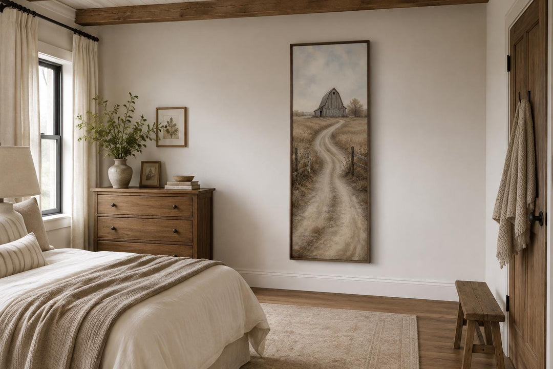 Tall narrow farmhouse wall art of a weathered barn on a winding road through golden fields.
