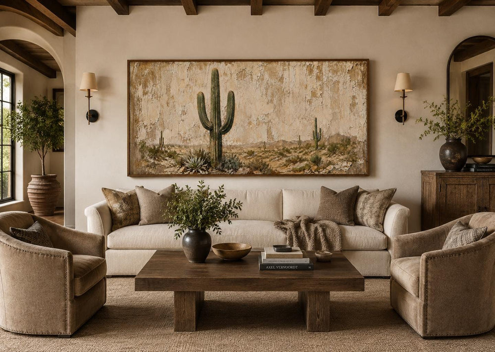 Minimalist saguaro cactus painting on weathered wood background canvas art in a neutral living room.
