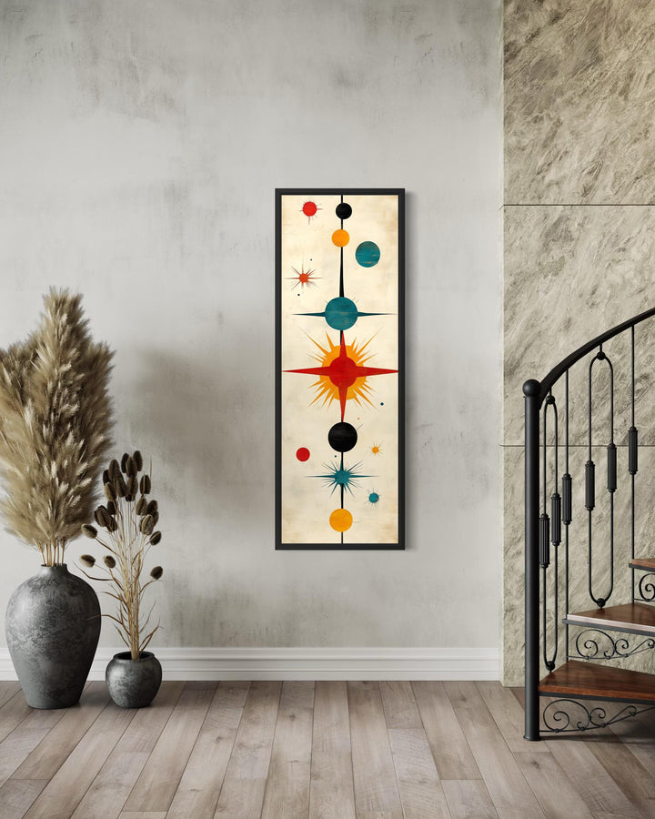 Vertical narrow mid-century modern wall art featuring an abstract atomic starburst print.