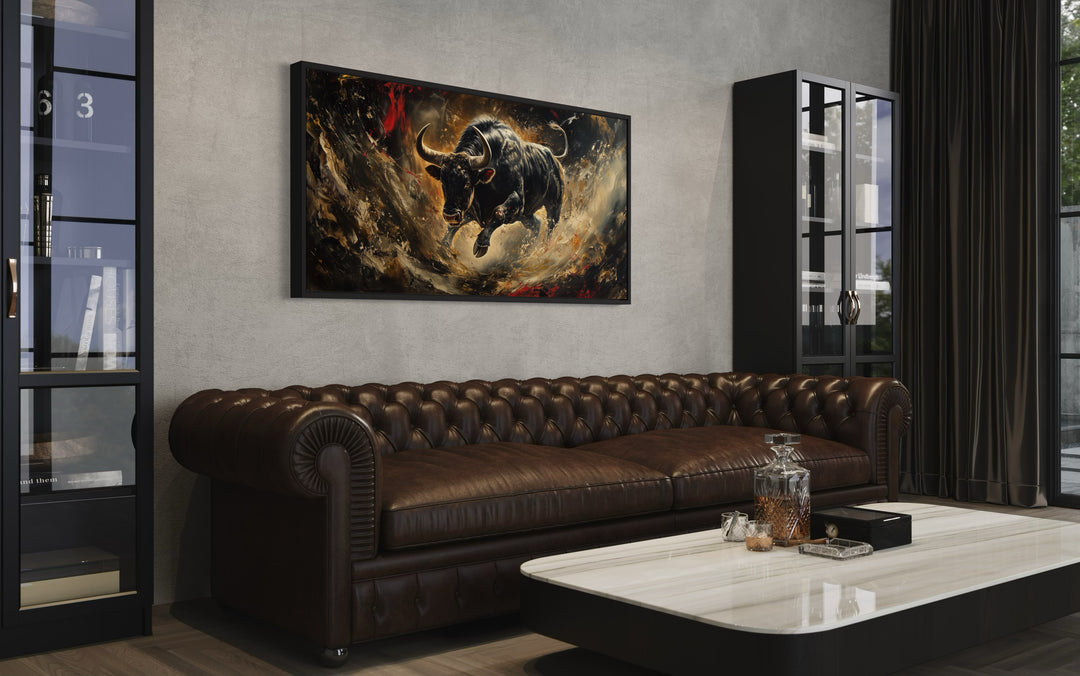 Spanish Fighting Bull Framed Canvas Wall Art in a living room with a couch and a table