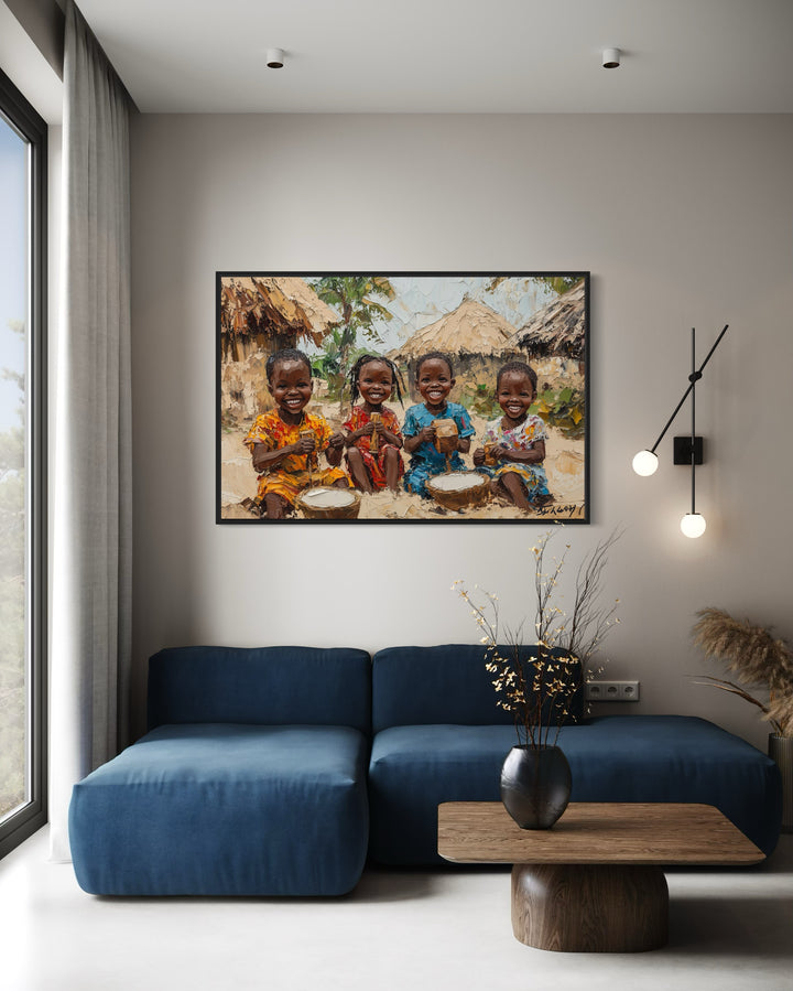 Happy African Children Playing In The Village Framed Canvas Wall Art in a living room with a blue couch and a painting on the wall