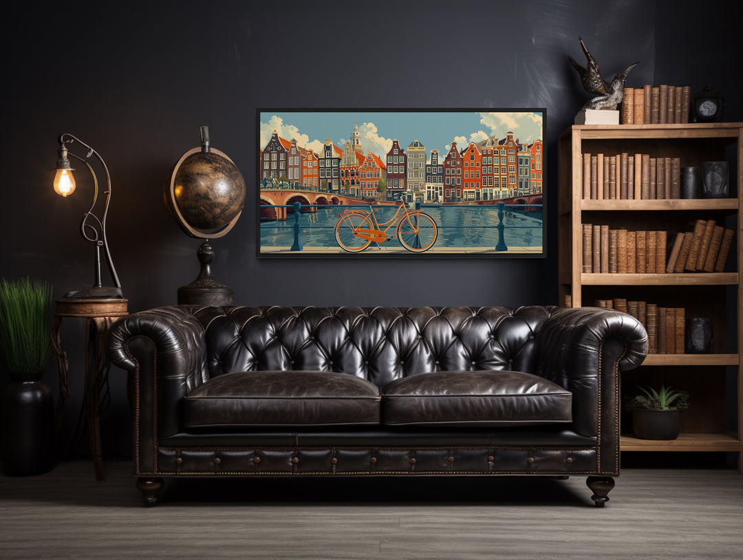 Amsterdam Canal And Bicycle Canvas Wall Art in a living room with a couch and a book shelf