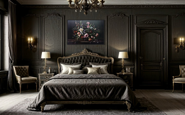 Dark Academia Moody Vintage Flowers Framed Canvas Wall Art above a bed sitting in a bedroom next to a chandelier