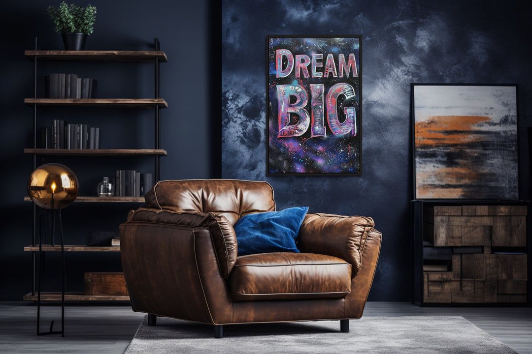 Dream Big Graffiti Painting Motivational Framed Canvas Wall Art in a living room with a brown leather chair