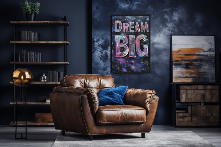 Dream Big Graffiti Painting Motivational Framed Canvas Wall Art in a living room with a brown leather chair