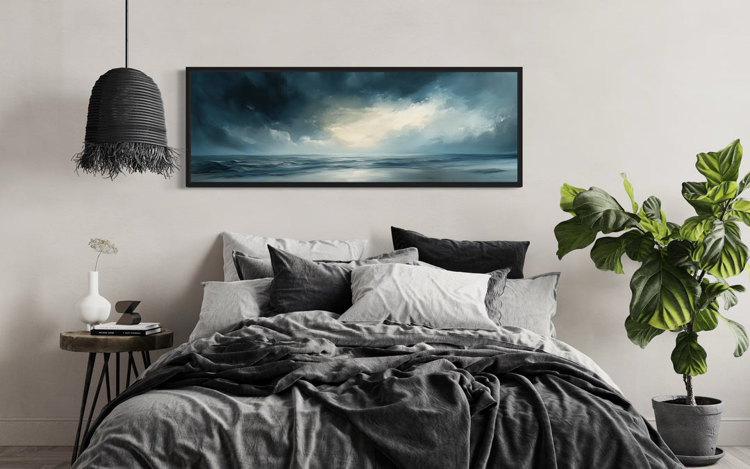 Stormy Horizon Over The Ocean Panoramic Canvas Wall Art above dark bed