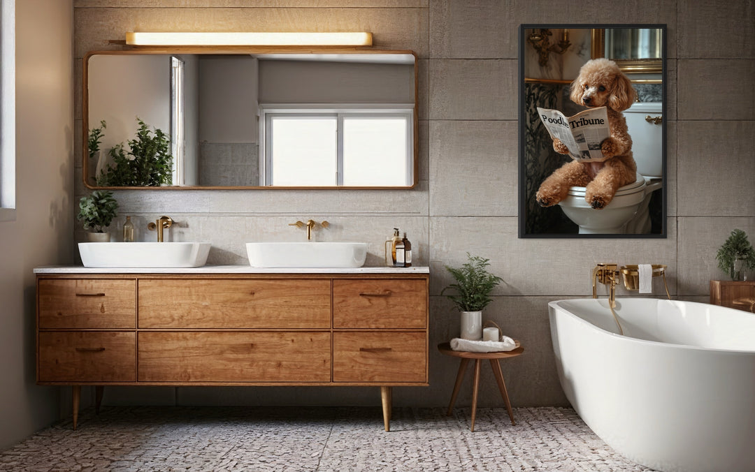 Peach Poodle On Toilet Reading Newspaper Framed Canvas Wall Art in bathroom