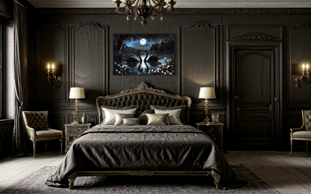 Two Black Swans In The Lake At Night Under Full Moon Romantic Framed Canvas Wall Art in a bedroom with a large bed and a chandelier