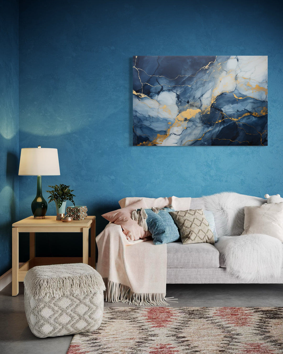 Navy Blue Grey Gold Abstract Marble Canvas Wall Art in a living room with blue walls and a white couch