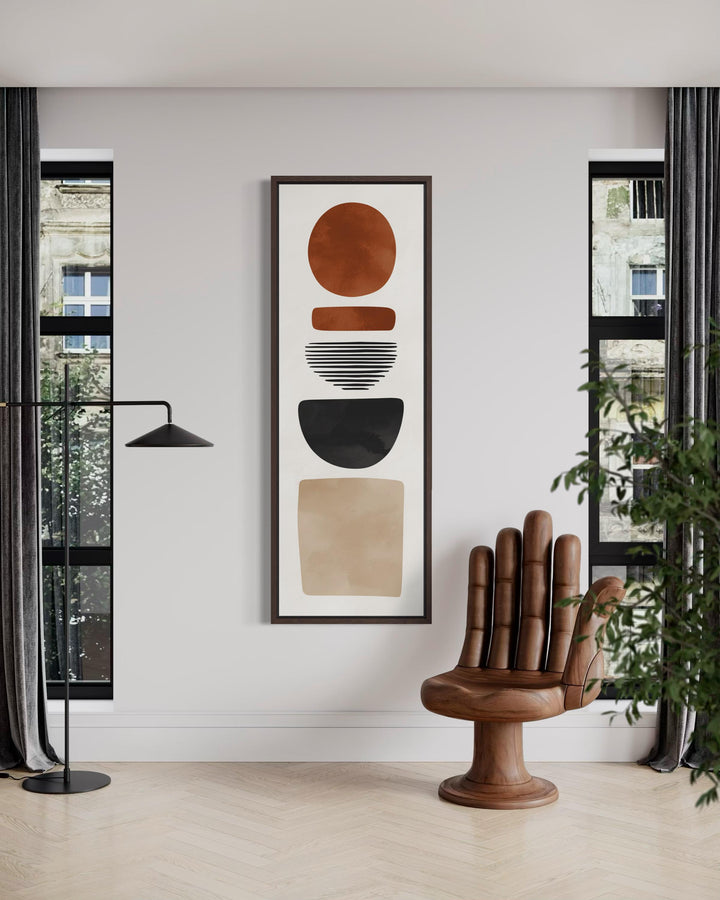 Tall narrow canvas wall art featuring stacked abstract geometric shapes in warm earthy tones.
