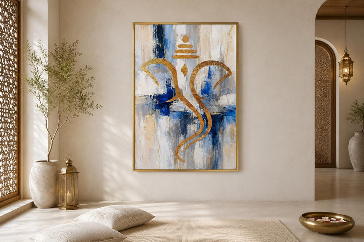 Abstract gold Ganesha silhouette wall art on a textured blue, white, and gold background.