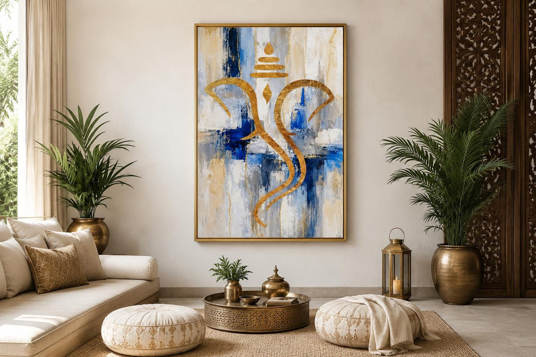 Abstract gold Ganesha silhouette wall art on a textured blue, white, and gold background.