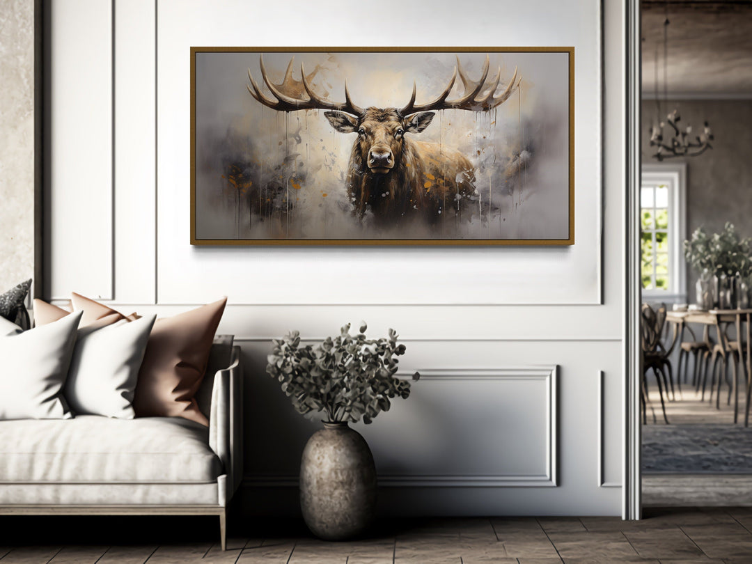 Extra large framed abstract moose canvas print in a rustic living room setting.