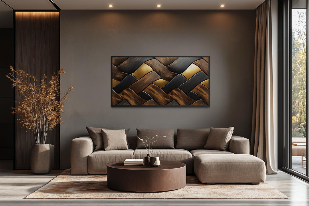 Abstract wood wall art with a modern geometric pattern in brown, black, and gold tones.