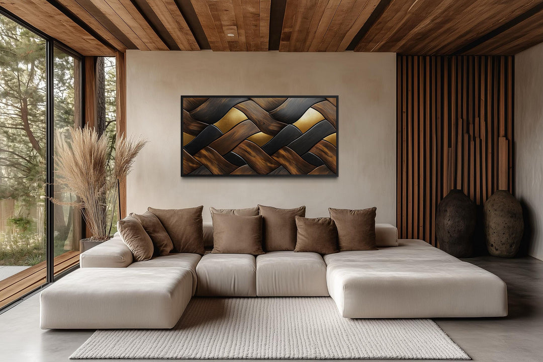 Abstract wood wall art with a modern geometric pattern hangs above a neutral sectional sofa.