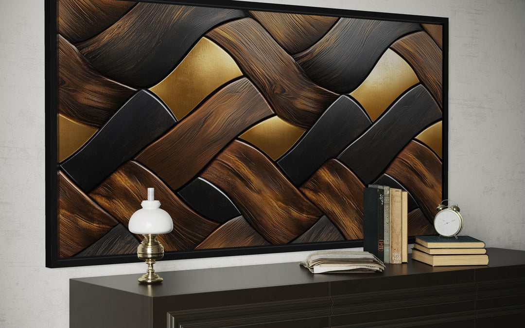 Abstract wood wall art featuring a modern geometric weave pattern in brown, black, and gold tones.