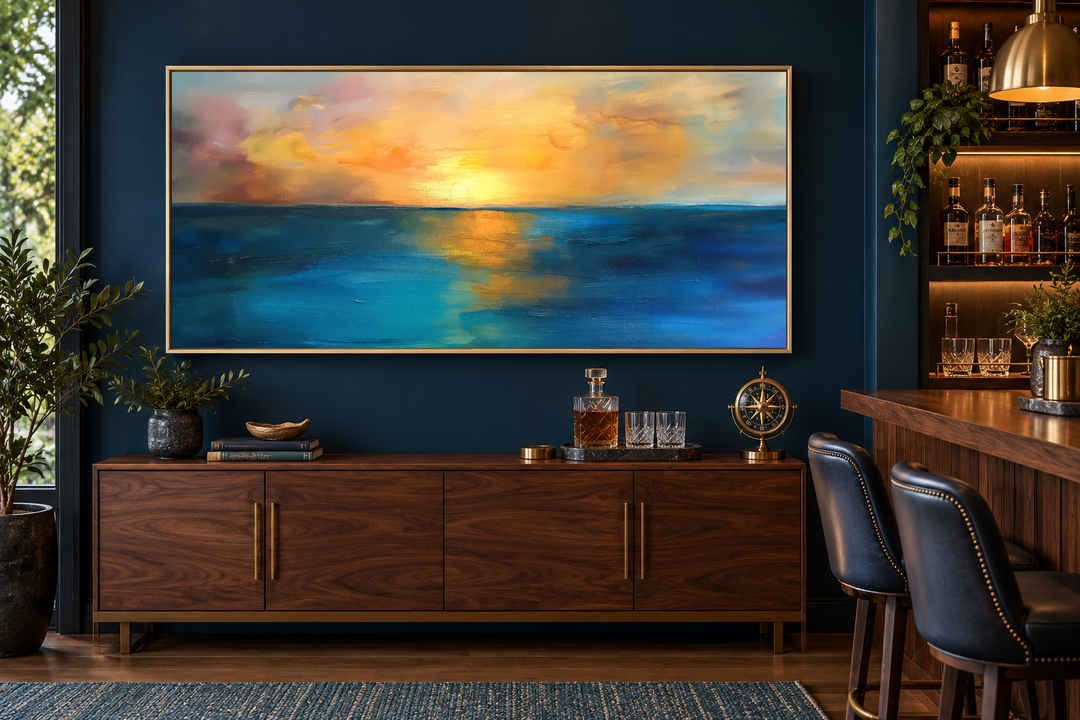Extra large framed abstract canvas art of a yellow and gold sunset over a navy blue ocean.