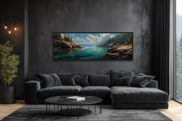 Acadia National Park long horizontal canvas wall art above a black sofa in a modern living room.