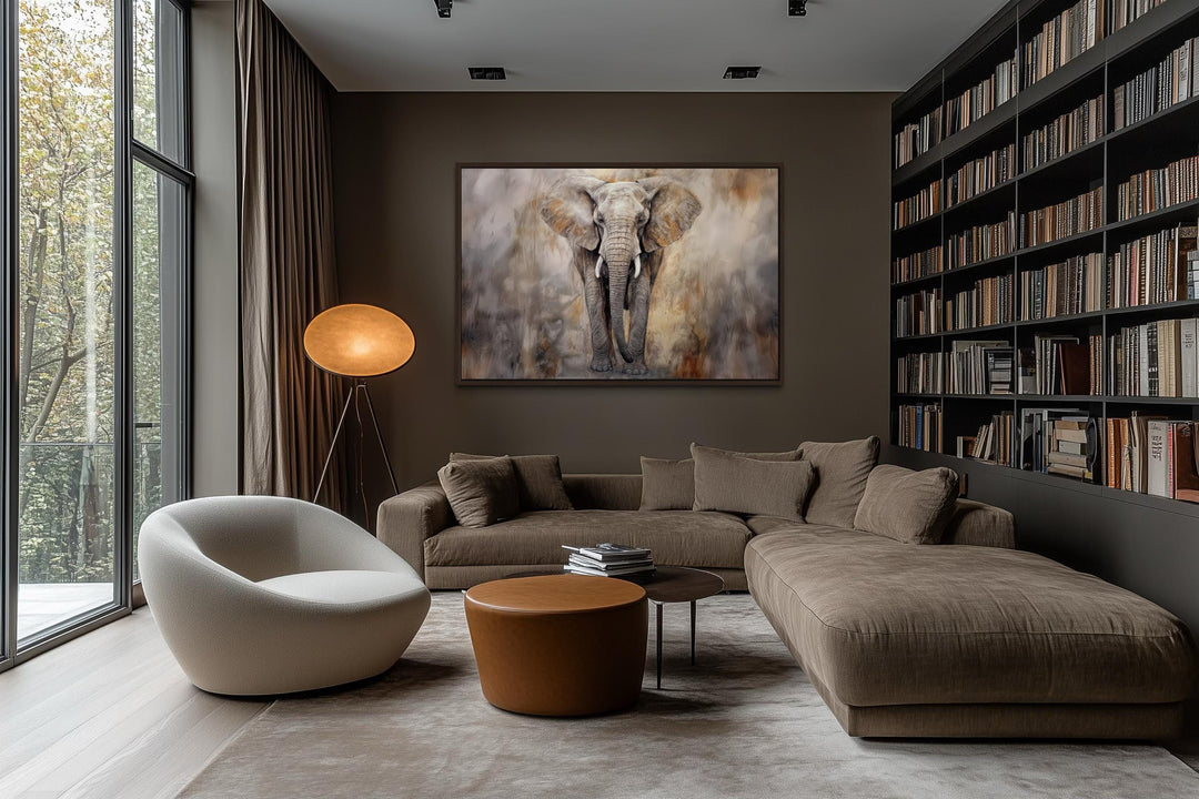 Extra large abstract canvas wall art of an African elephant in a modern living room with a bookshelf.