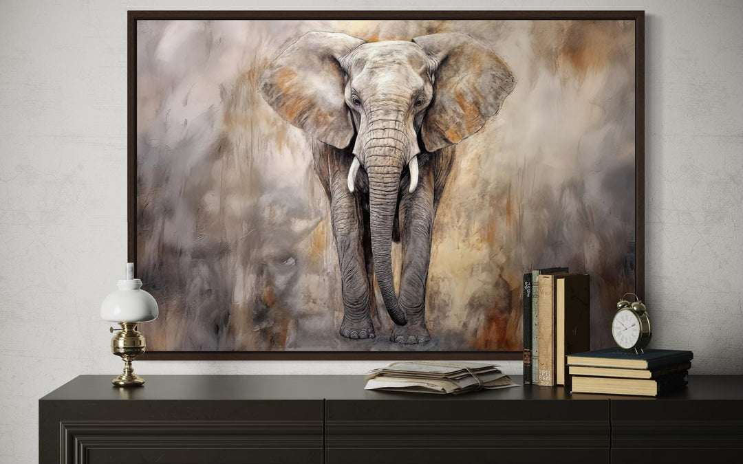 African Elephant Abstract Extra Large Canvas Wall Art in a dark wood frame above a console table.