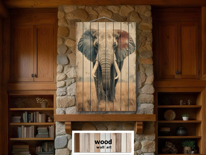 African elephant distressed wood wall art hanging on a stone fireplace in a rustic room.