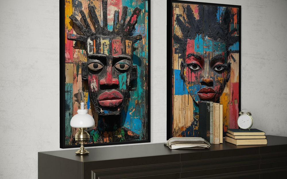 Set of two colorful African mask canvas prints featuring abstract tribal faces in bold jewel tones.