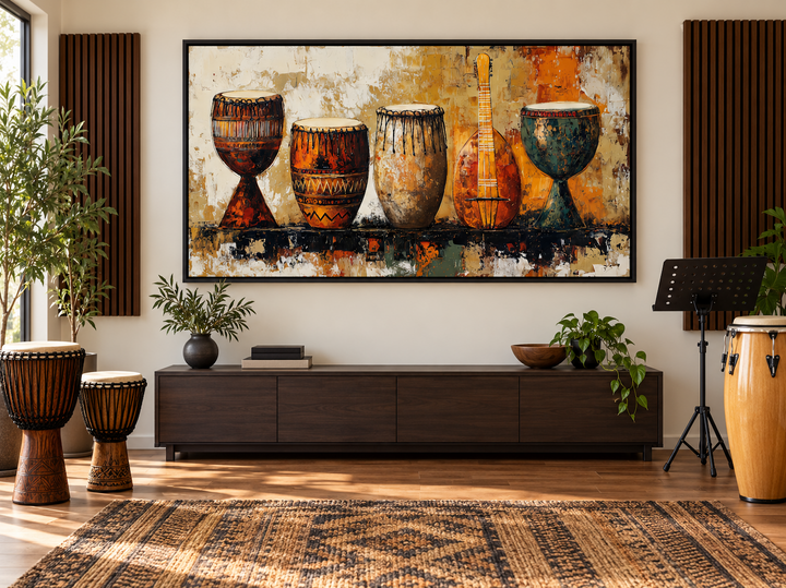 African Musical Instruments Framed Canvas Wall Art featuring djembe drums and a stringed instrument.