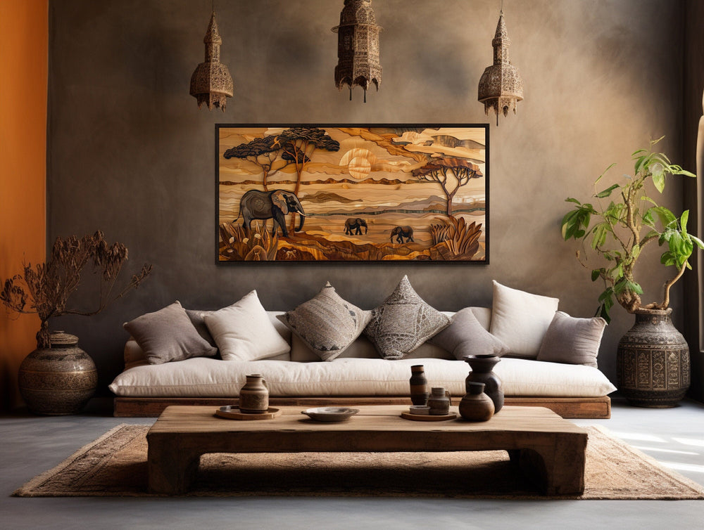 Framed African savanna wall art with elephants and acacia trees.