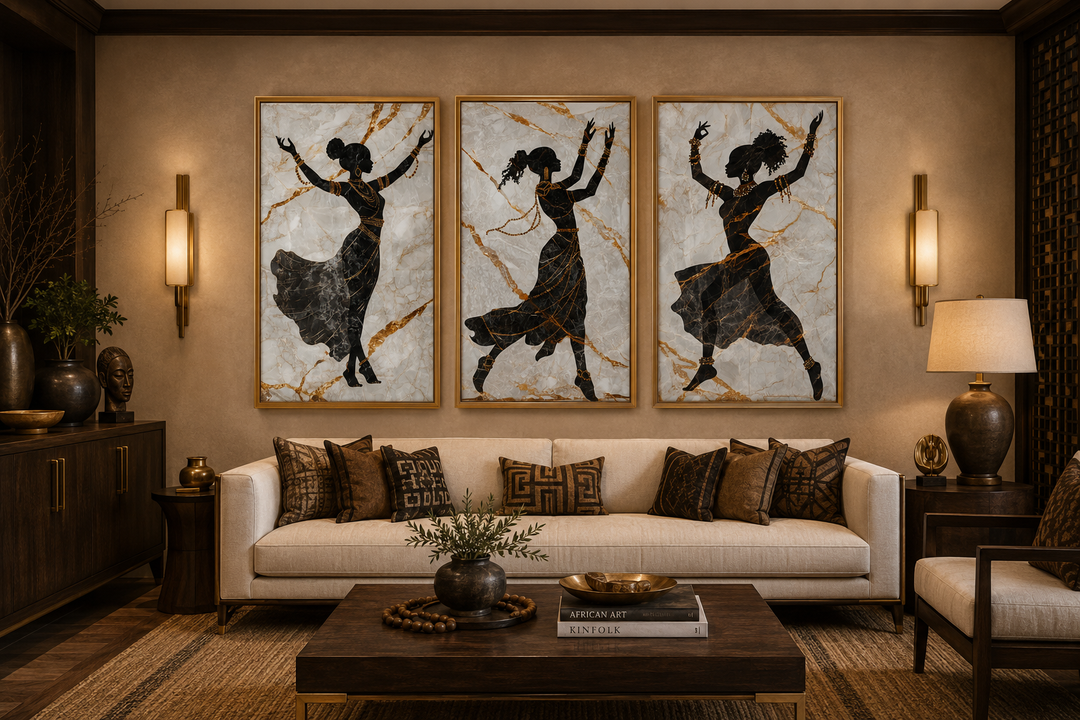 Three-piece framed canvas art of dancing African women silhouettes on marble with gold accents.