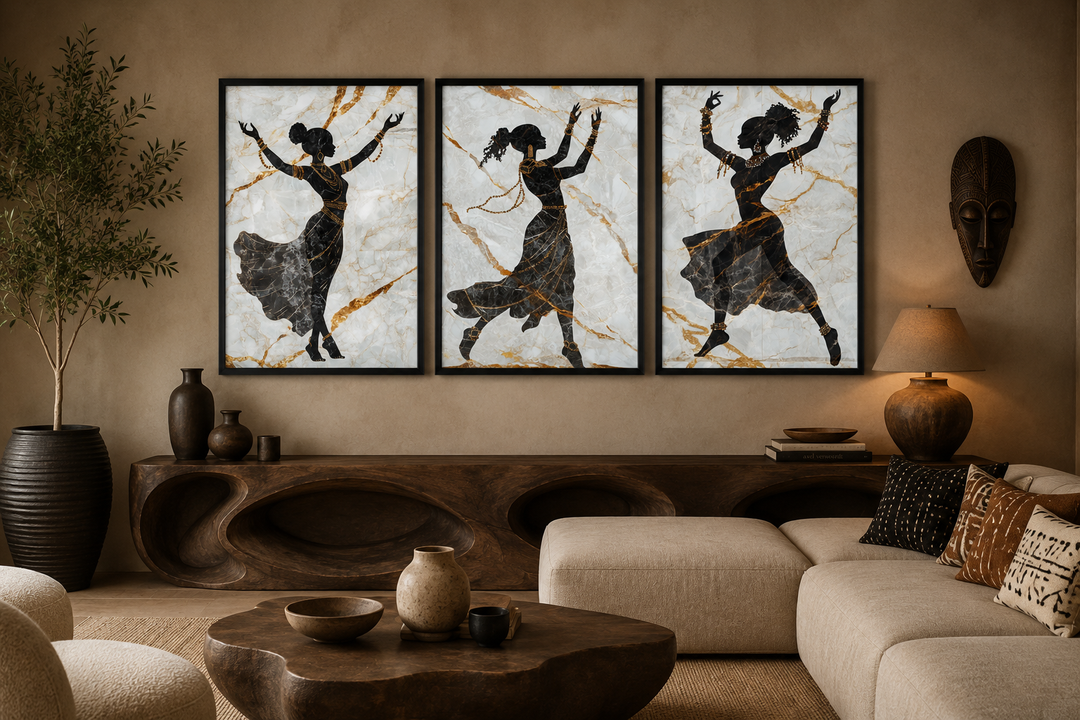 Three-piece framed canvas art of dancing African women silhouettes on marble with gold accents.