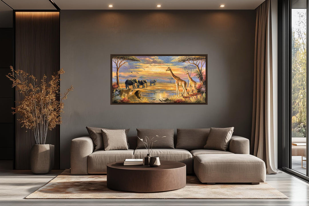 African wildlife safari canvas wall art featuring elephants and giraffes in a modern living room.