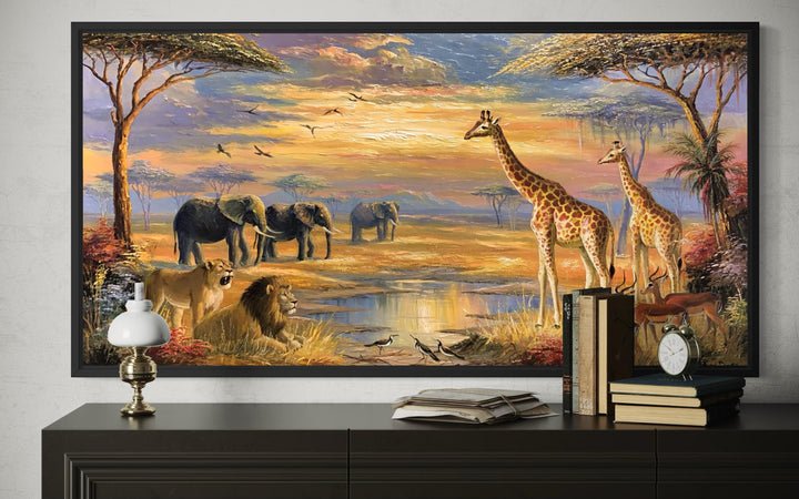 African wildlife safari canvas wall art featuring elephants, giraffes, and lions at sunset.