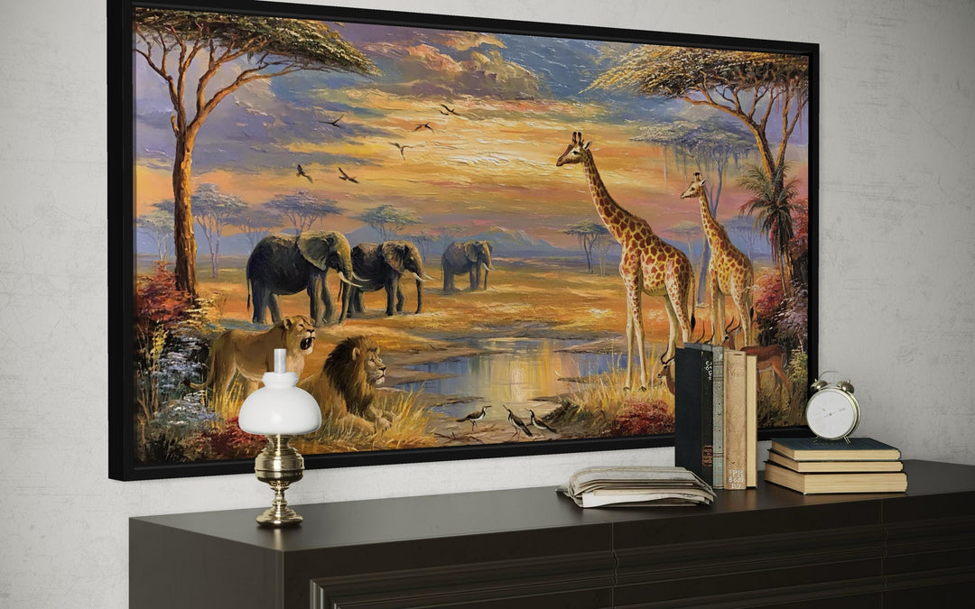 African wildlife safari canvas wall art featuring elephants, giraffes, and lions at sunset.
