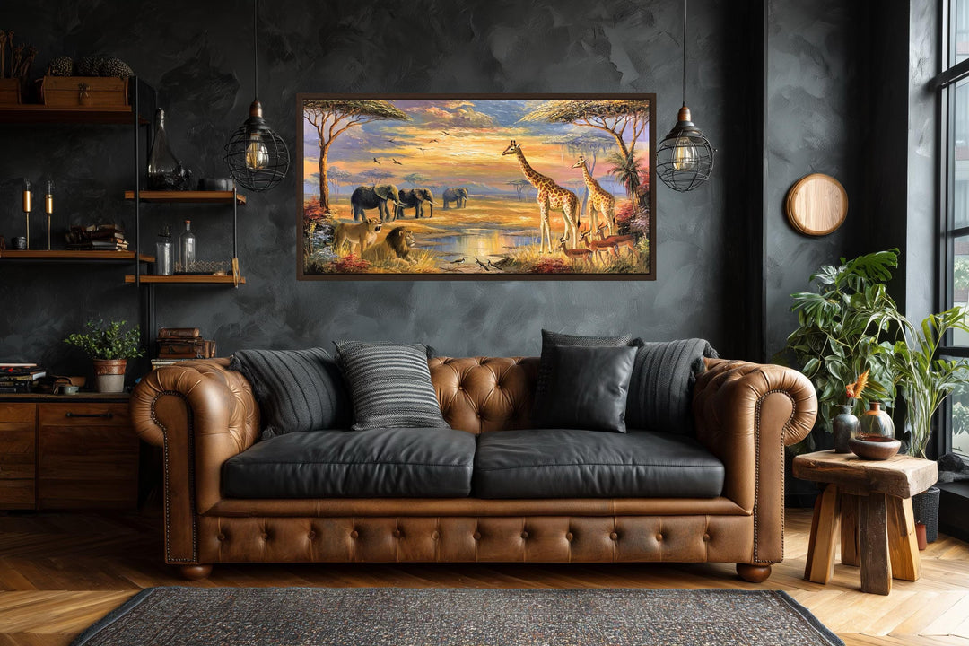 African wildlife safari canvas wall art featuring giraffes, elephants, and lions at sunset.