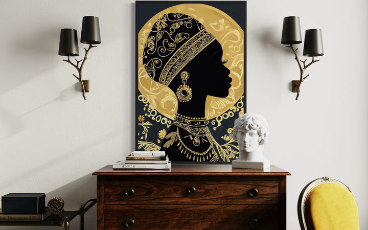 Black and gold African woman portrait canvas print in an elegant modern interior setting.