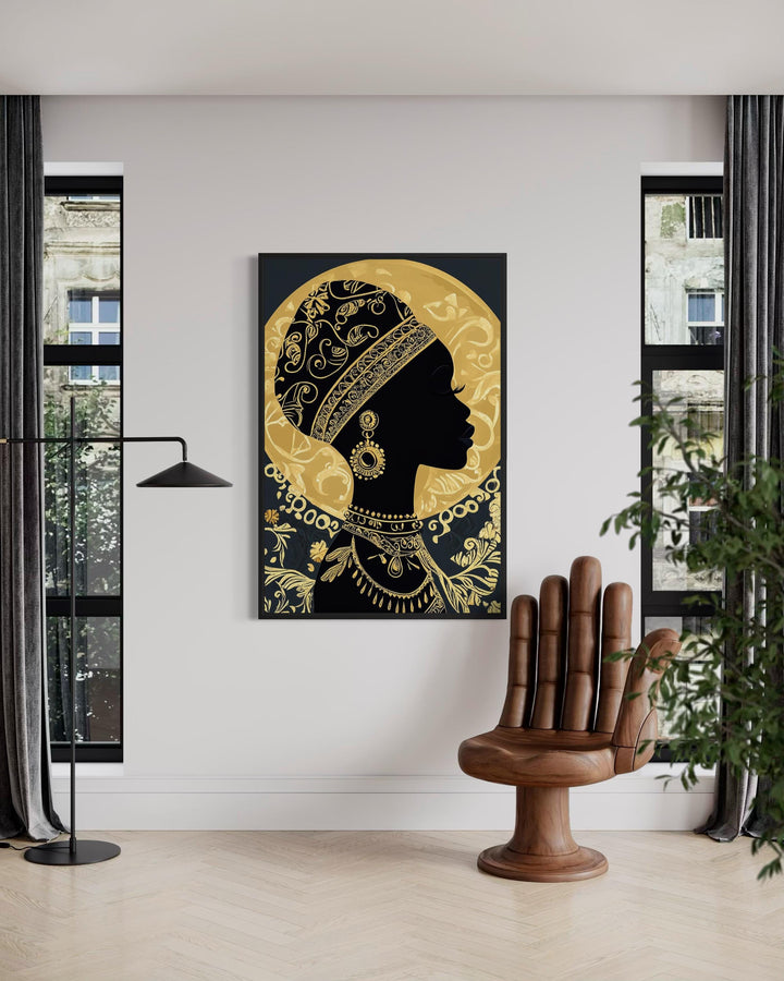 A black and gold silhouette of an African woman in a headwrap, framed on a white wall.