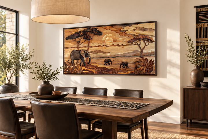 Framed African savanna wall art featuring elephants and acacia trees in a rustic dining room.