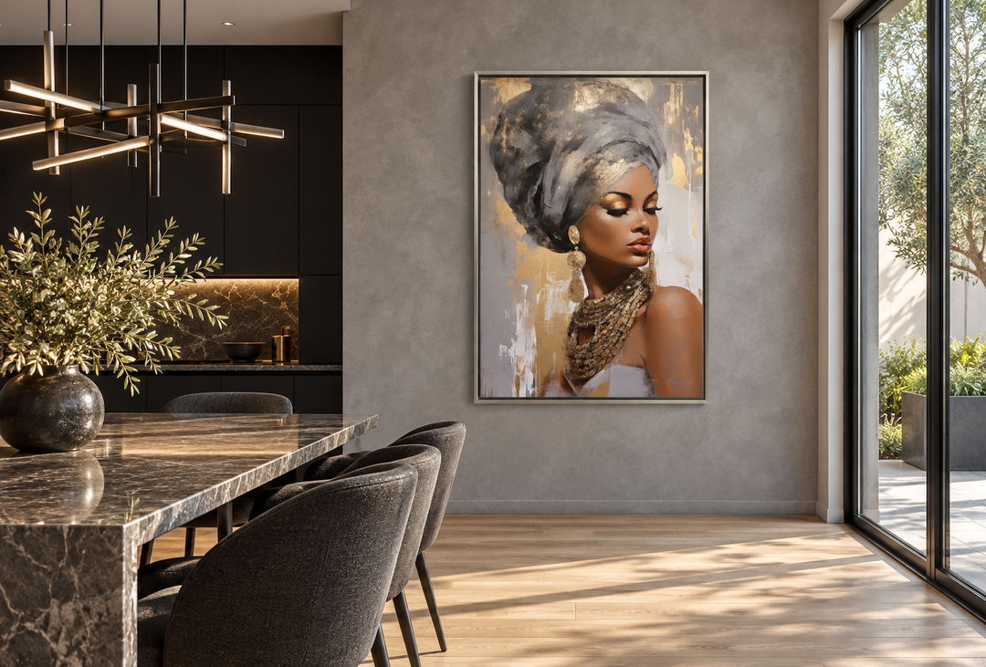 Framed canvas wall art of a Black woman in a grey headwrap and gold jewelry in a modern dining room.