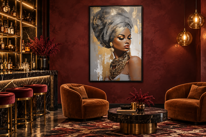 Framed canvas wall art of a Black woman in a gold and silver headwrap in a modern lounge setting.